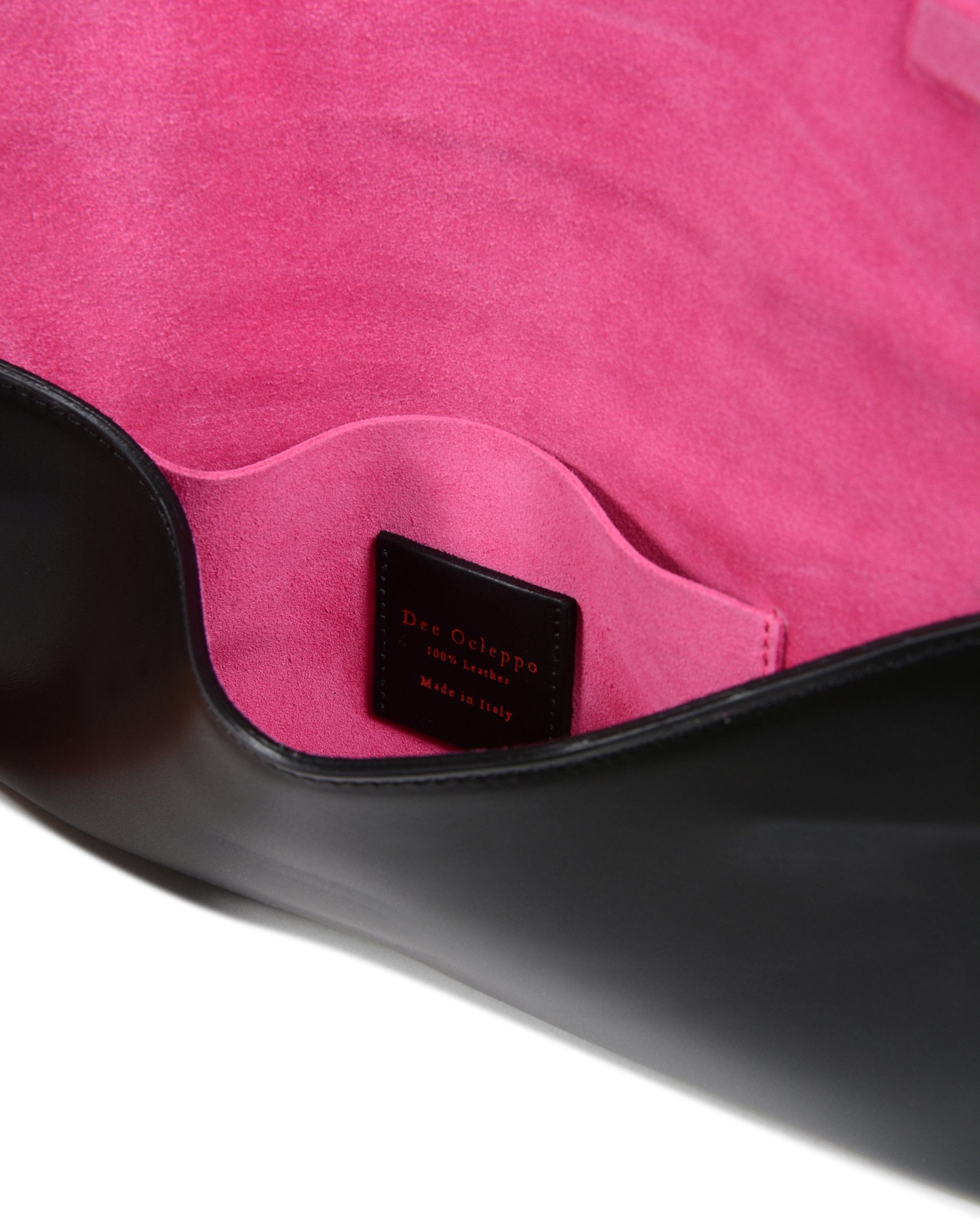 Clutch tipo sobre de piel color negro