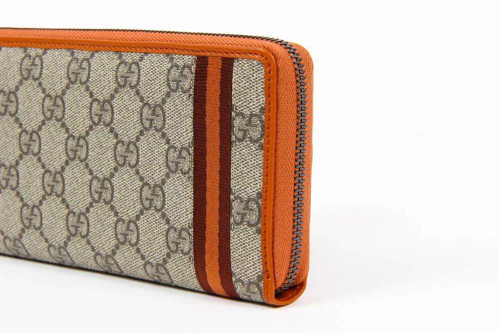 Cartera de mano con cremallera alrededor de lona Guccissima Web GG Supreme para hombre de Gucci