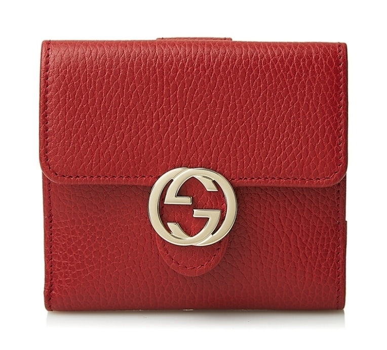 Cartera pequeña Gucci de piel entrelazada en color rojo