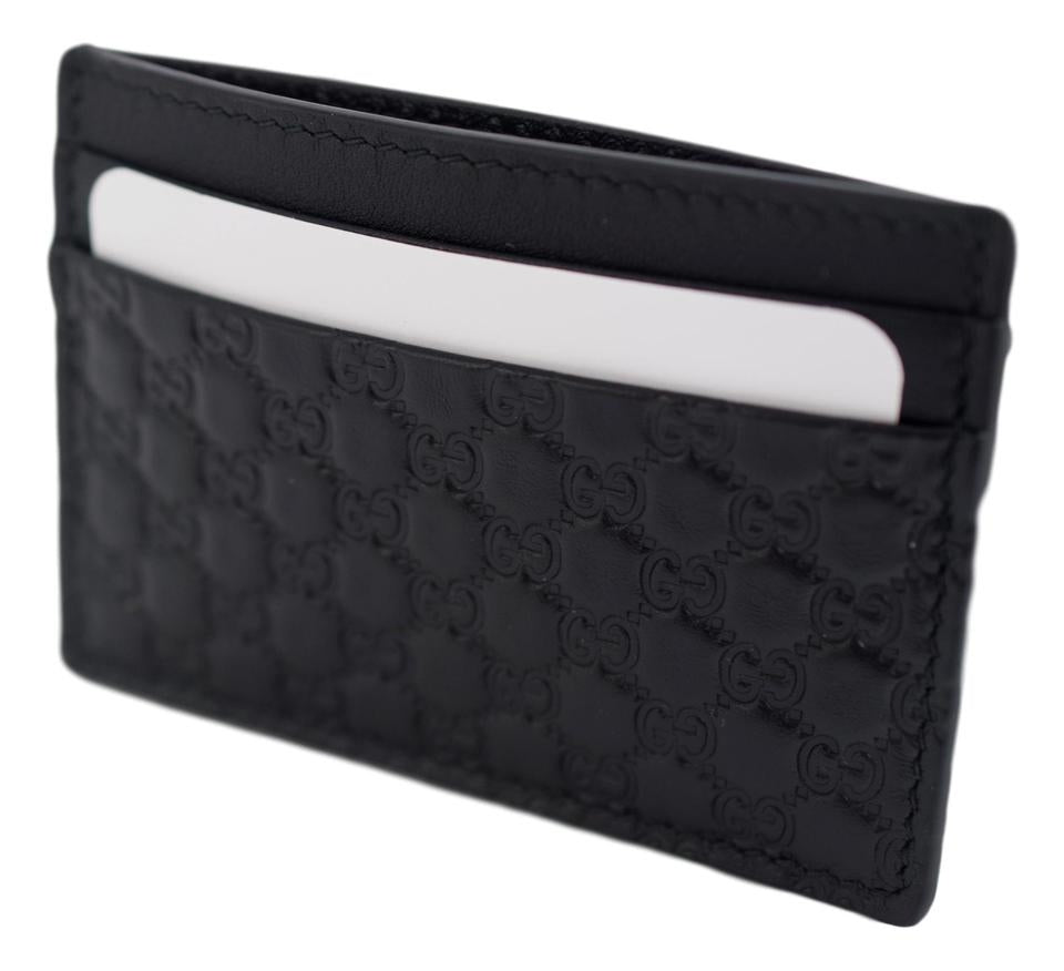 Tarjetero de piel Gucci Guccissima negro