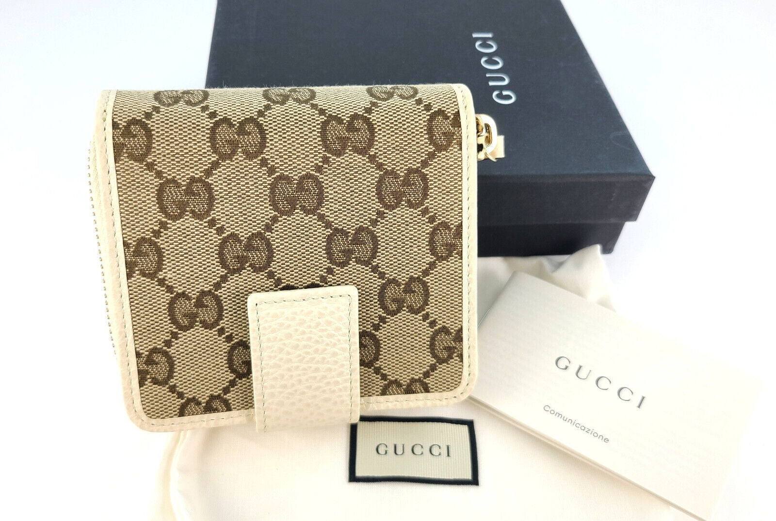 Cartera Gucci Original GG de lona y piel en beige y blanco