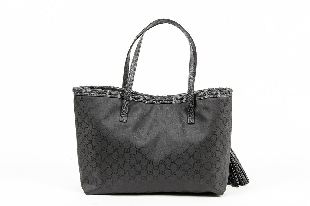 Bolso de mano Gucci para mujer de piel granulada negra con borlas de bambú