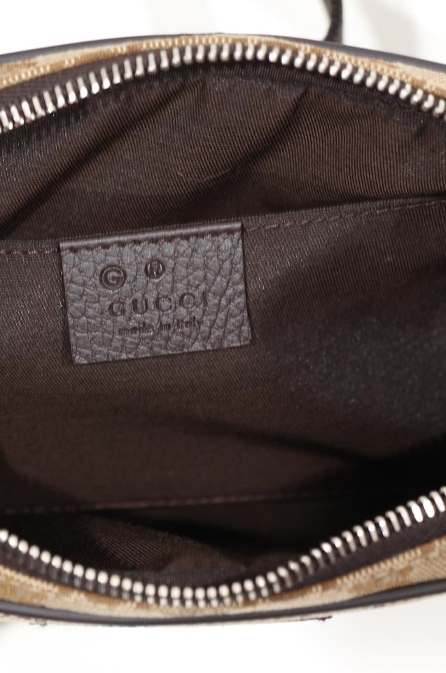 Riñonera Gucci en color beige y marrón