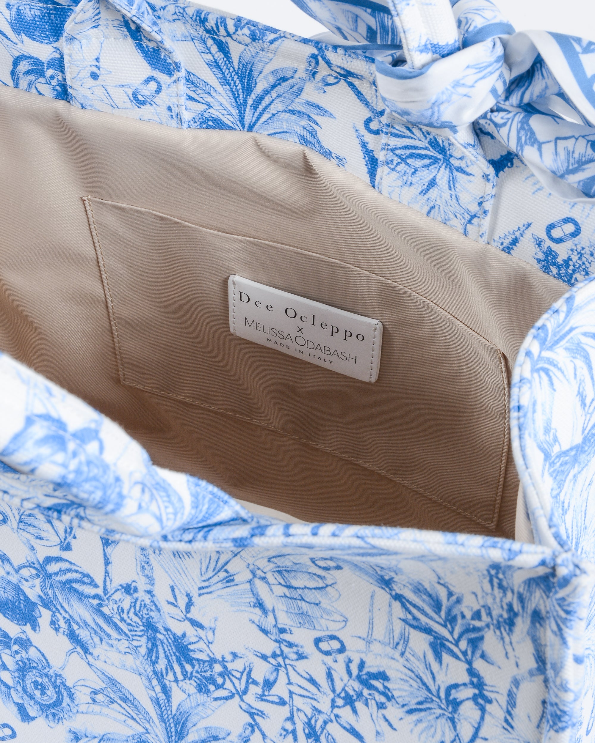 Bolso de mano con estampado tropical de Dee & Melissa