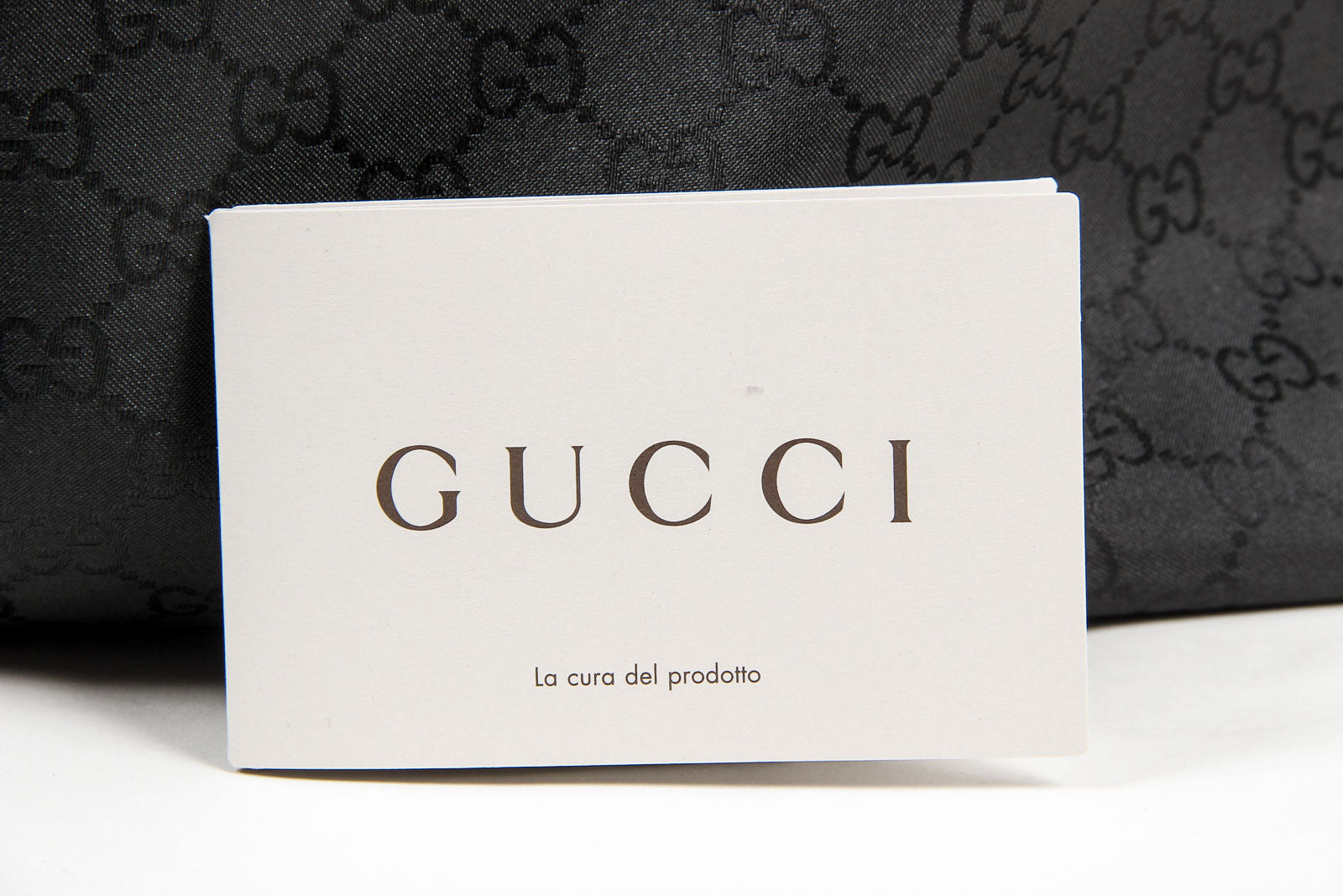 Bolso de mano Gucci para mujer de piel granulada negra con borlas de bambú