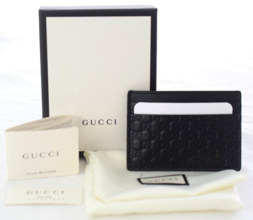 Tarjetero de piel Gucci Guccissima negro
