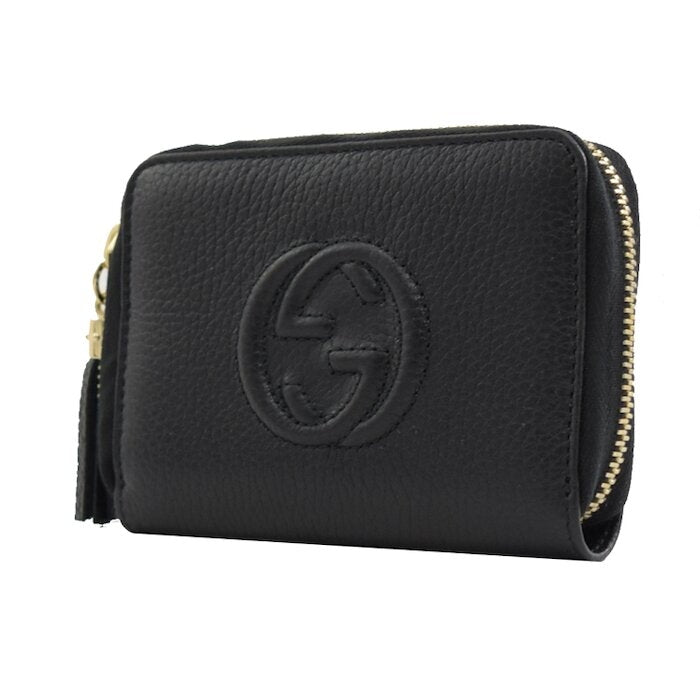 Cartera pequeña con cremallera Gucci Soho de piel con estampado GG en color negro