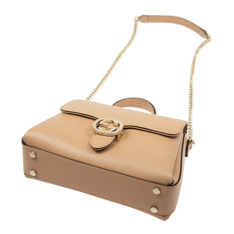 Bolso Gucci de piel entrelazada con cadena beige