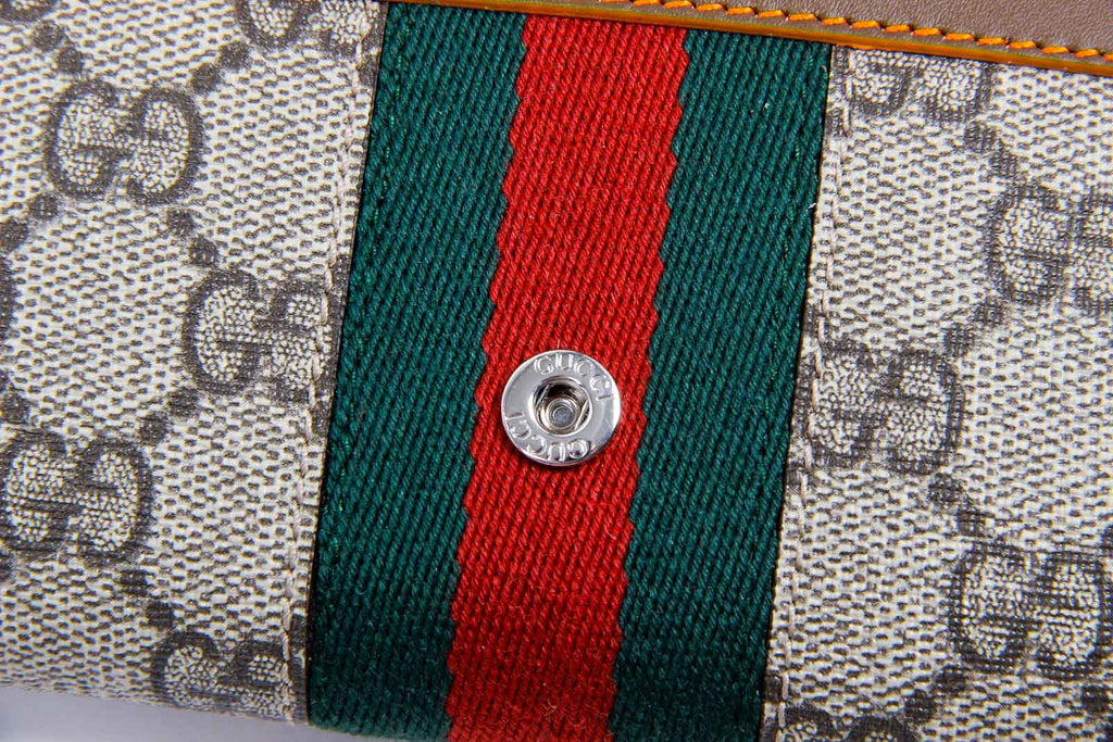 Monedero Gucci Supreme de dos pliegues para mujer