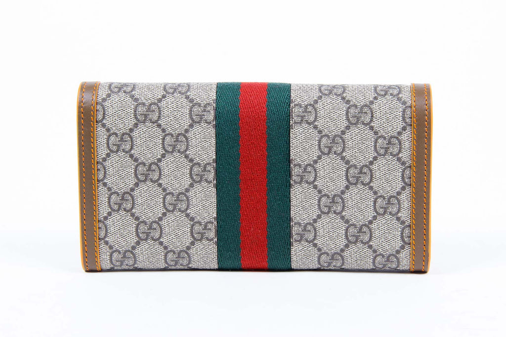 Monedero Gucci Supreme de dos pliegues para mujer