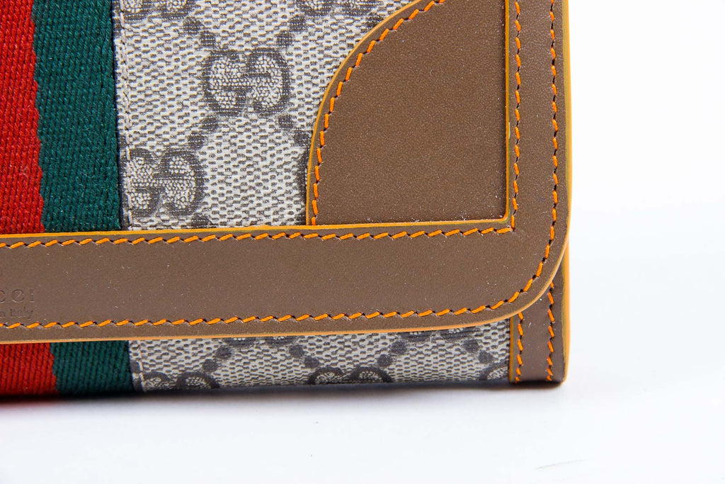 Monedero Gucci Supreme de dos pliegues para mujer