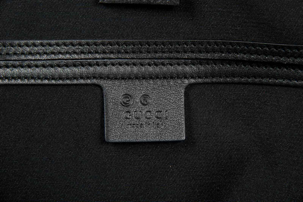 Bolso tote Gucci para mujer de piel negra Guccissima con logotipo GG